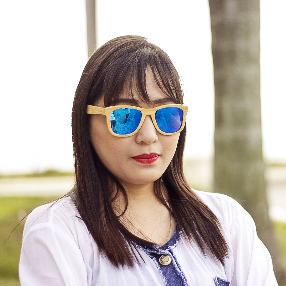 blaker blue mirror lens bamboo sunglasses lifestyle photo women