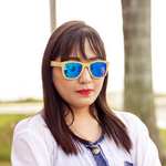 blaker blue mirror lens bamboo sunglasses lifestyle photo women