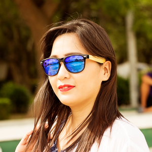 coniston blue mirror polarized lens bamboo sunglasses lifestyle photo for women